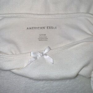 White American Eagle Top with bow babydoll top